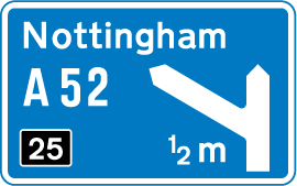 Motorway junction ahead, displaying the route number and destination reached by taking this route sign