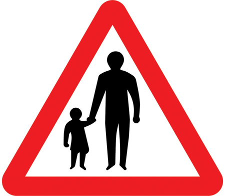 UK pedestrians in road warning sign: a triangle showing people walking with no crossing stripes.