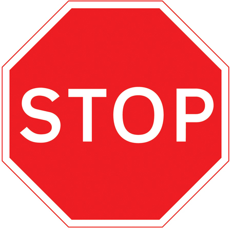 UK STOP sign: a red octagon with the word STOP in white letters.