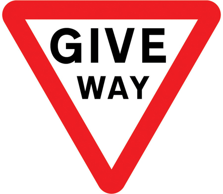 UK give way sign: a downward-pointing red-bordered triangle.