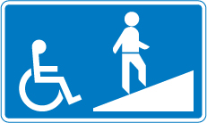Ramped entrance to pedestrian overbridge sign